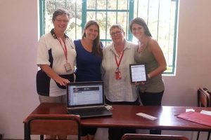 Tuleeni Orphanage in the Kilimanjaro region of Tanzania. Home of the first Digi Truck. Jeanette & Ric with Mandy and another Neema International representative.